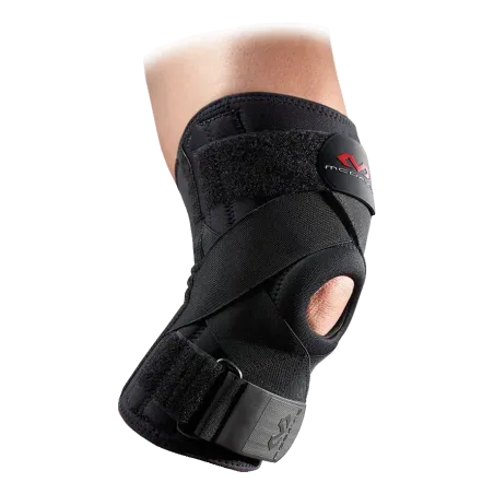 Genouillère avec baleines à ressort et bandes straps croisées