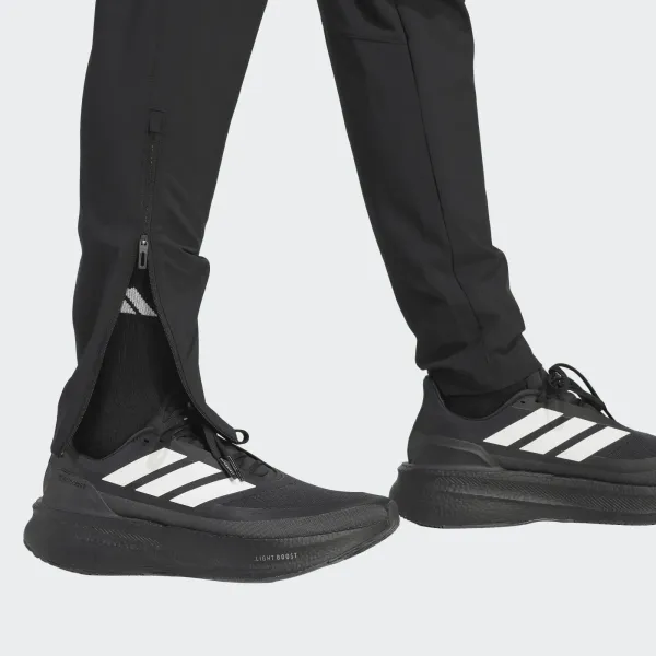 Pantalon woven Tiro Travel – Noir