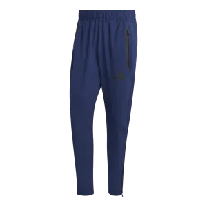 Pantalon woven Tiro Travel – Marine